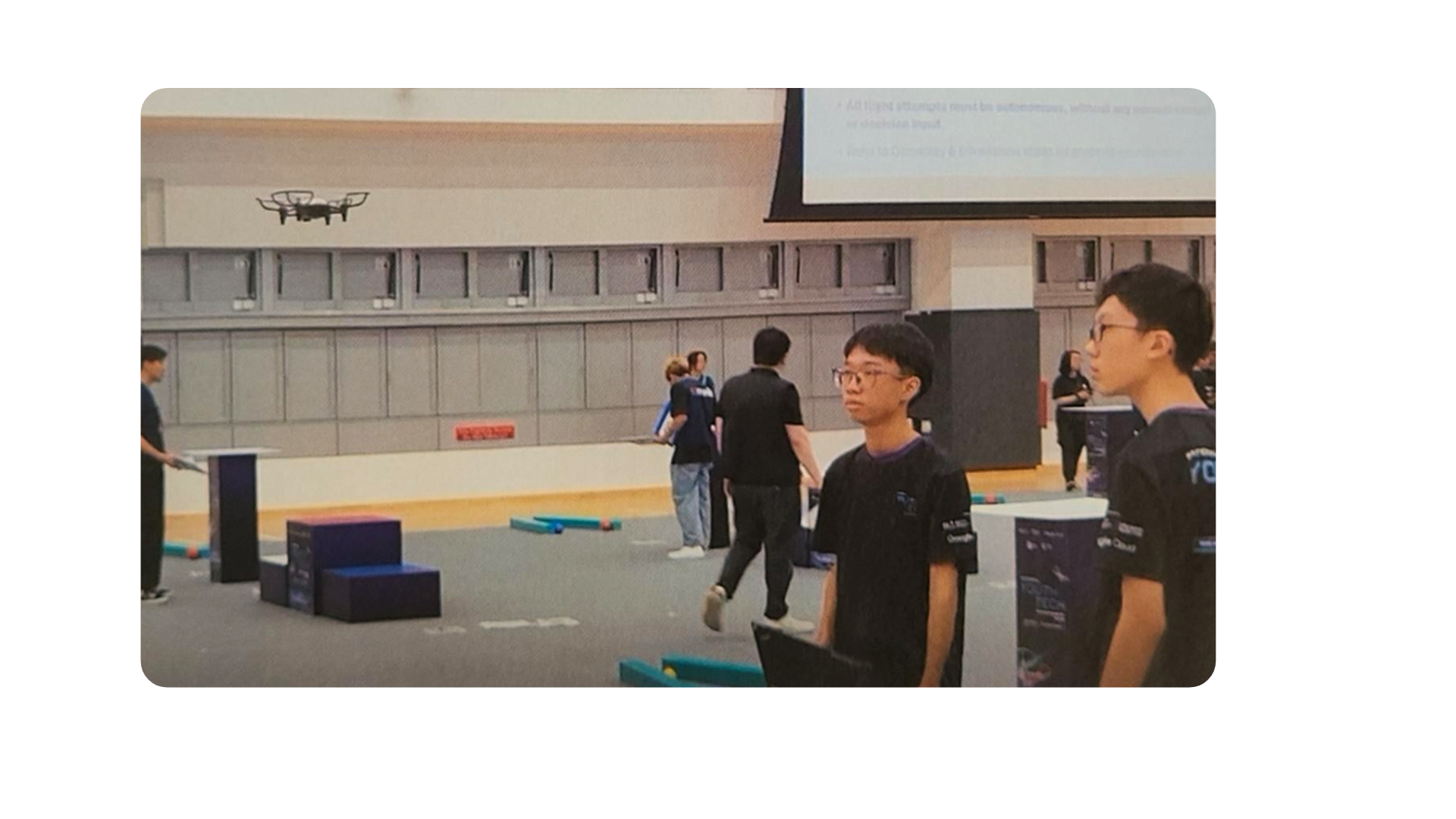 Students trying to fly their drone